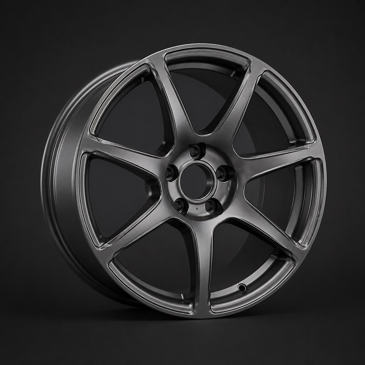 Satin gunmetal OEM-style replacement wheel finish sample.